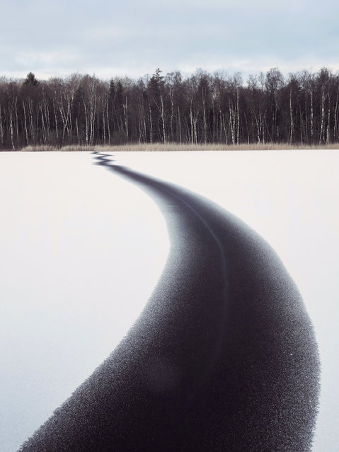 The art of ecology category winner: Jesamine Bartlett. A crack in a Swedish lake stretches the entire width of the lake. (Photo by Photograph: Jesamine Bartlett/University of Birmingham and British Antarctic Survey/British Ecological Society)