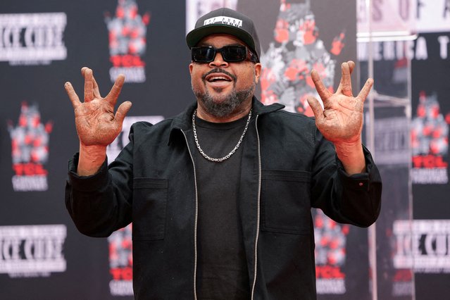 Rapper and actor Ice Cube gestures, after placing his hands in cement, during a ceremony, at the forecourt of the TCL Chinese Theatre in Los Angeles on April 15, 2025. (Photo by Mario Anzuoni/Reuters)