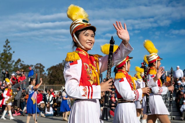 The Taipei first girls high school marching band perform at the 134th rose parade in Pasadena, California on January 2, 2023. (Photo by Michael Owen Baker/AP Photo)