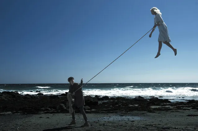 In this image released by 20th Century Fox, Asa Butterfield, left, and Ella Purnell appear in a scene from, “Film Review Miss Peregrine’s Home for Peculiar Children”. Miss Peregrine’s Home For Peculiar Children is released on September 30, 2016. (Photo by Jay Maidment/20th Century Fox via AP Photo)