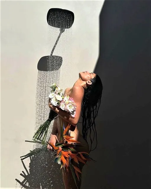 American media personality and socialite Kylie Jenner in the second decade of February 2023 puts a floral spin on an outdoor shower. (Photo by kyliejenner/Instagram)