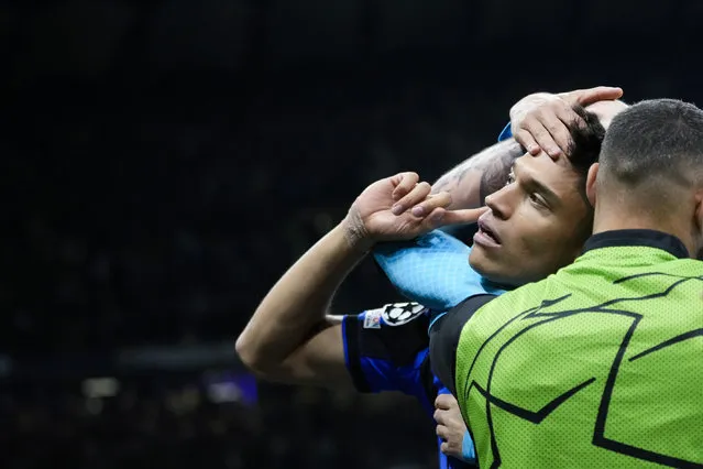 Inter Milan's Joaquin Correa celebrates with teammates after scoring his side's third goal during the Champions League quarterfinal second leg soccer match between Inter Milan and Benfica at the San Siro stadium in Milan, Italy, Wednesday, April 19, 2023. (Photo by Luca Bruno/AP Photo)