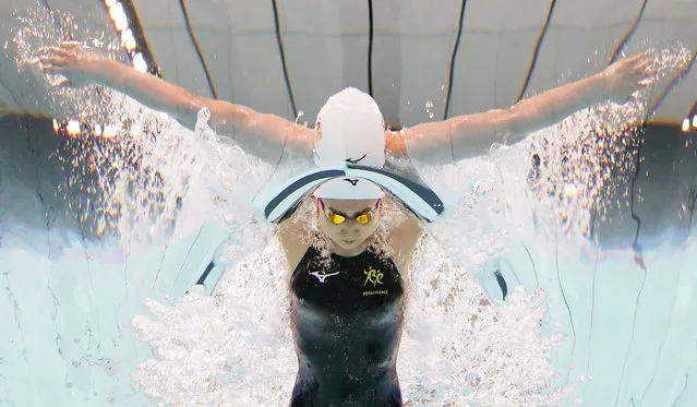 In this photo taken by underwater camera,  Japanese swimmer Rikako Ikee competes on way to winning the women's 100-meter butterfly at the Japan’s national championships at Tokyo Aquatics Centre in Tokyo, Sunday, April 4, 2021. Ikee on Sunday qualified for the Tokyo Olympics just two years after the was diagnosed with leukemia. (Photo by Iori Sagisawa/Kyodo News via AP Photo)