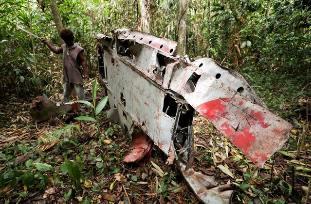 Debris of Imperial Japan fighter “Zero” remains in a jungle on September 8, 2016 in Guadalcanal Island, Solomon Islands. (Photo by The Asahi Shimbun via Getty Images)