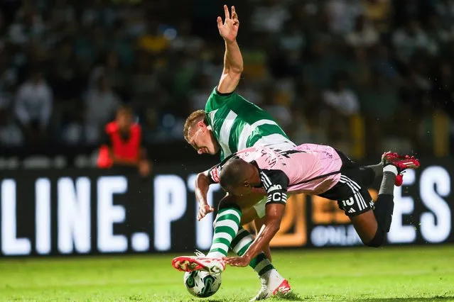 Casa Pia`s Vasco Fernandes (R) fights for the ball with Sporting`s Gyokeres during their Portuguese First League soccer match held at Rio Maior Municipal Stadium, Rio Maior, Portugal, 18 August 2023. (Photo by Paulo Cunha/EPA)