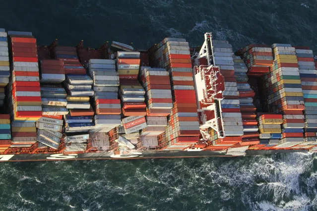 A handout aerial photo made available by the Dutch Coastguard on January 3, 2019 shows the container ship MSC ZOE. Up to 270 containers had fallen off the Panamanian-flagged MSC ZOE, one of the world's biggest container ships, in rough weather near the German island of Borkum and floated southwest toward Dutch waters. (Photo by Dutch Coastguard/Handout via Reuters)