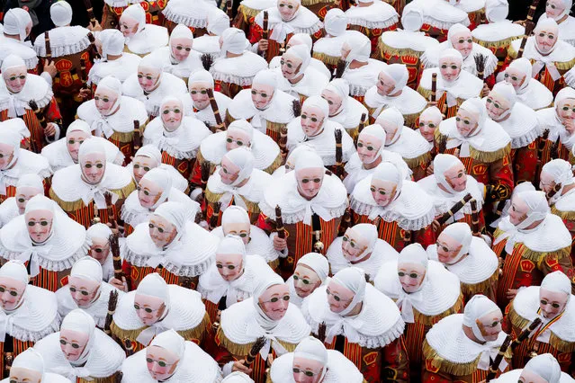 Festival participants known as “Gilles”, wearing traditional costumes, during Carnival celebrations in the streets of Binche, Belgium, 05 March 2019. The Carnival de Binche is a popular historical cultural event that was named a Masterpiece of the Oral and Intangible Heritage of Humanity by UNESCO in 2003. (Photo by  Stéphanie Lecocq/EPA/EFE)