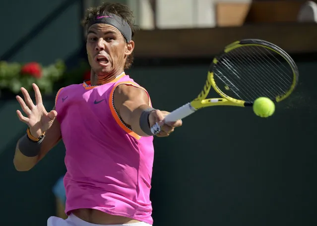 Rafael Nadal, of Spain, misplays a shot from Karen Khachanov, of Russia, and loses the point at the BNP Paribas Open tennis tournament Friday, March 15, 2019, in Indian Wells, Calif. (Photo by Mark J. Terrill/AP Photo)