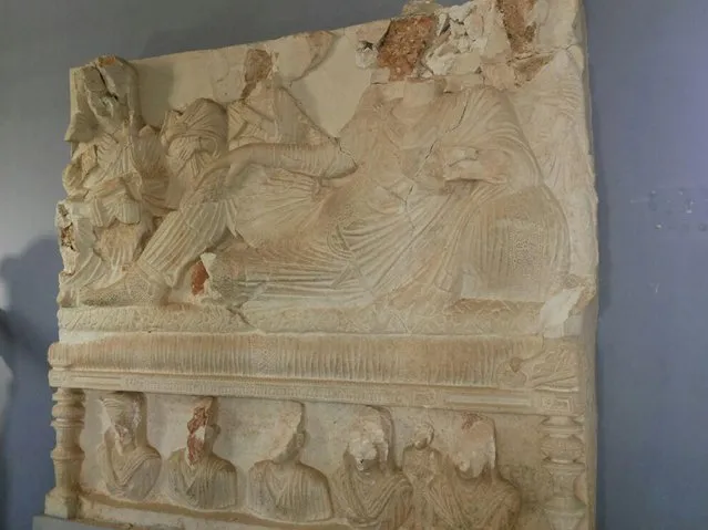A view shows a damaged artefact at the museum of the historic city of Palmyra, after forces loyal to Syria's President Bashar al-Assad recaptured the city, in Homs Governorate in this handout picture provided by SANA on March 27, 2016. (Photo by Reuters/SANA)