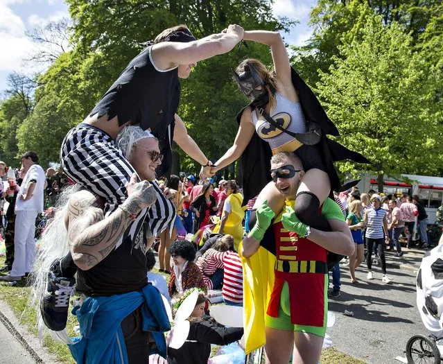 People take part in the Grand Parade of Aalborg Carnival in Aalborg, Denmark May 23, 2015. (Photo by Henning Bagger/Reuters/Scanpix Denmark)