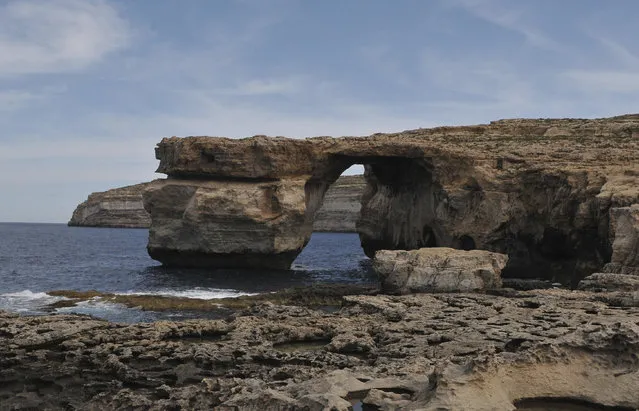 In this undated file photo, The Azure Window, a natural rock arch which jutted onto the sea off Malta and was a backdrop for the “Game of Thrones” TV series, is seen as it was before collapsing in a storm. (Photo by Christian Mansion/AP Photo)