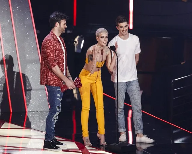 Singer Halsey (C) and DJs Alex Pall (L) and Andrew Taggart (R) of The Chainsmokers accept the Dance Song of the Year award for “Closer” onstage at the 2017 iHeartRadio Music Awards which broadcast live on Turner's TBS, TNT, and truTV at The Forum on March 5, 2017 in Inglewood, California. (Photo by Rich Polk/Getty Images for iHeartMedia)