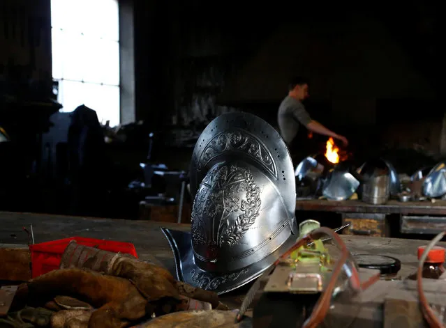 Blacksmith Johann Schmidberger works on a suit of armour for the Vatican's Swiss Guards at his workshop in Molln, Austria, March 29, 2017. (Photo by Leonhard Foeger/Reuters)