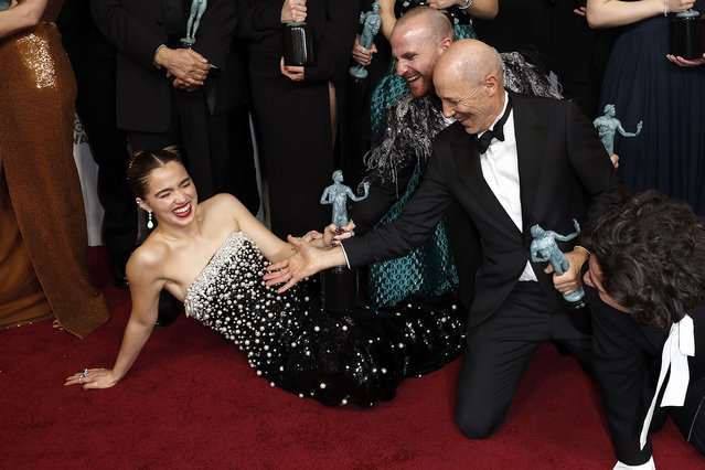 (L-R) American actors Haley Lu Richardson, Paolo Camilli and Jon Gries, recipients of the Outstanding Performance by an Ensemble in a Drama Series award for “The White Lotus”, pose in the press room during the 29th Annual Screen Actors Guild Awards at Fairmont Century Plaza on February 26, 2023 in Los Angeles, California. (Photo by Frazer Harrison/Getty Images)