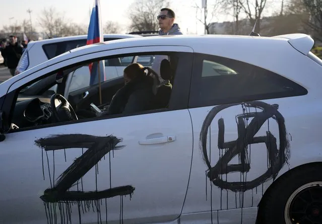 A sticker with a letter Z is seen on a car during a rally in support of Russia in Belgrade, Serbia, Sunday, March 13, 2022. (Photo by Darko Vojinovic/AP Photo)