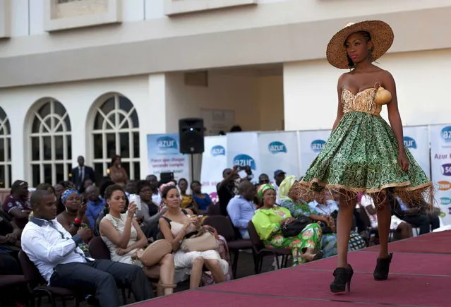 A model presents a creation during a fashion show organized by designer and stylist Sonia Bafonga to celebrate International Women's Day with the theme of promoting peace, in the capital of Bangui March 8, 2014. (Photo by Camille Lepage/Reuters)