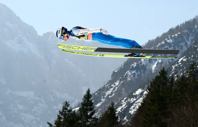 Switzerland's Andreas Schuler competes in the men's team event at the Ski Jumping World Cup 2022 in Planica, Slovenia on March 26, 2022. (Photo by Borut Zivulovic/Reuters)