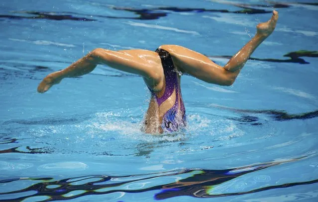 China's Huang Xuechen performs in the synchronised swimming solo free routine preliminary at the Aquatics World Championships in Kazan, Russia July 27, 2015. (Photo by Michael Dalder/Reuters)