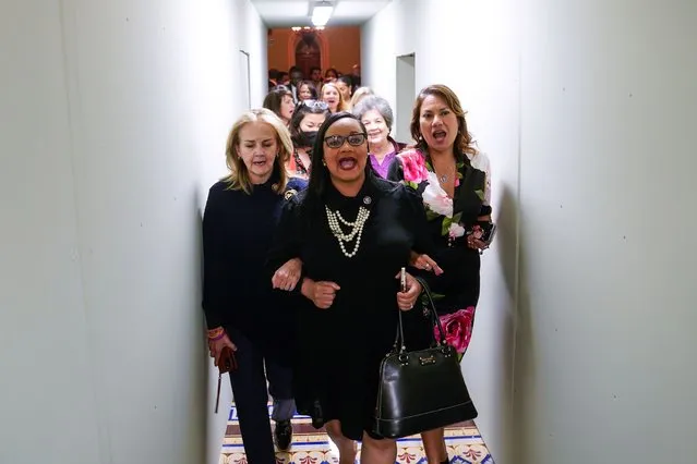 Members of the US House of Representatives protest on their way to the Senate Chamber ahead of a vote on an abortion rights bill on Capitol Hill on Tuesday, May 11, 2022 in Washington, DC. (Photo by Jabin Botsford/The Washington Post)