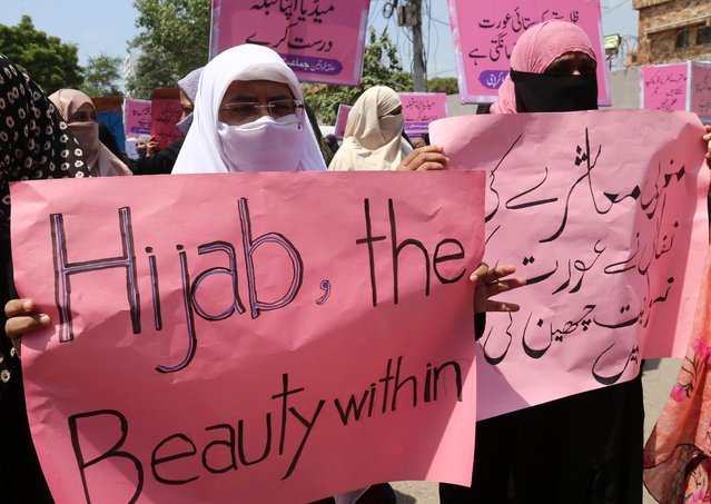 Supporters of Islamic political party Jamat-e-Islami rally to create awareness on Hijab (women veil) in Karachi, Pakistan, 04 September 2024. The Women's Wing of Jamaat-i-Islami (JI) organized Hijab Walks across the country to observe Hijab Day, emphasizing the significance of the hijab for Muslim women. Participants, including professionals from diverse fields, carried banners advocating for the freedom to wear the veil and the respect of women's rights to make personal choices about their attire. (Photo by Rehan Khan/EPA/EFE)