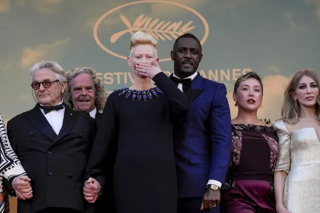 Director George Miller, from left, Doug Mitchell, Tilda Swinton, Idris Elba, Augusta Gore, and Zerrin Tekindor pose for photographers upon arrival at the premiere of the film “Three Thousand Years of Longing” at the 75th international film festival, Cannes, southern France, Friday, May 20, 2022. (Photo by Petros Giannakouris/AP Photo)