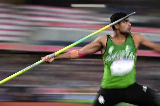 Pakistan's Arshad Nadeem competes to win and take the gold medal in the men's javelin throw final athletics event at the Alexander Stadium, in Birmingham on day ten of the Commonwealth Games in Birmingham, central England, on August 7, 2022. (Photo by Ben Stansall/AFP Photo)