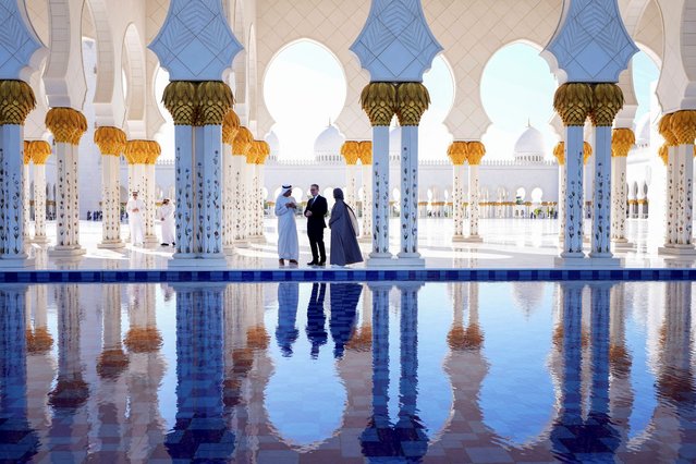 Britain's Prime Minister Keir Starmer is led by Director General Yousif Al Obaidli and tour guide Mahra as he visits the Sheikh Zayed Grand Mosque in Abu Dhabi, United Arab Emirates on December 9, 2024. (Photo by Kirsty Wigglesworth/Reuters)