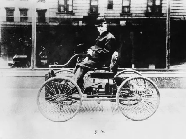 Henry Ford is seen on the Quadricycle, the first automobile he ever built in Dearborn, Mich., 1896. (Photo by AP Photo)