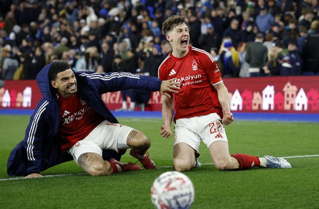 Morgan Gibbs-White and Ryan Yates of Nottingham Forest celebrate after the team's victory in the penalty shoot out in the Emirates FA Cup Quarter Final match between Brighton & Hove Albion and Nottingham Forest at Amex Stadium on March 29, 2025 in Brighton, England. (Photo by Peter Cziborra/Action Images via Reuters)