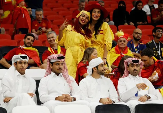 Fans of Spain show their support during the FIFA World Cup Qatar 2022 Group E match between Spain and Germany at Al Bayt Stadium on November 27, 2022 in Al Khor, Qatar. (Photo by Albert Gea/Reuters)
