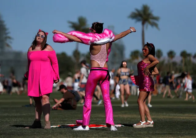 Concertgoers dance at the Coachella Valley Music and Arts Festival in Indio, California, U.S., April 15, 2018. (Photo by Mario Anzuoni/Reuters)