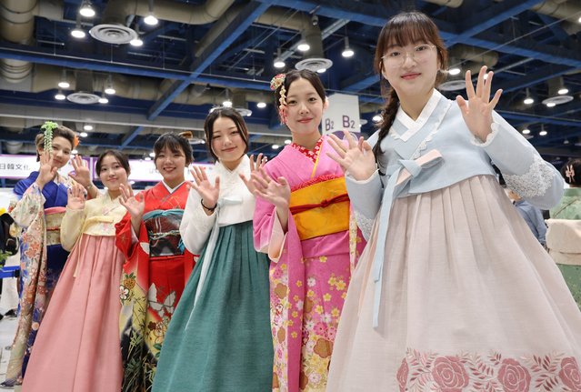 Volunteers of Korean and Japanese nationalities wearing hanbok and kimono pose for a commemorative photo during the Korea-Japan Cultural Festival held at COEX in Gangnam-gu, Seoul on October 12, 2025. (Photo by Jang Gyeong-sik)