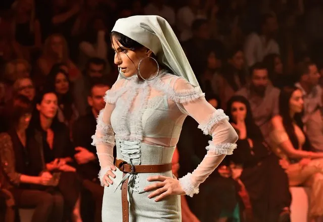 A model walks the runway during the Amato show at Fashion Forward Spring/Summer 2017 held at the Dubai Design District on October 23, 2016 in Dubai, United Arab Emirates. (Photo by Cedric Ribeiro/Getty Images)