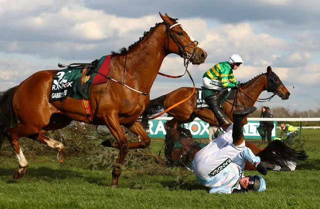 Peter Carberry riding Gabbys Cross falls off during the Randox Grand National Chase during day three of the Randox Grand National Festival at Aintree Racecourse on April 15, 2023 in Liverpool, England. (Photo by Michael Steele/Getty Images)