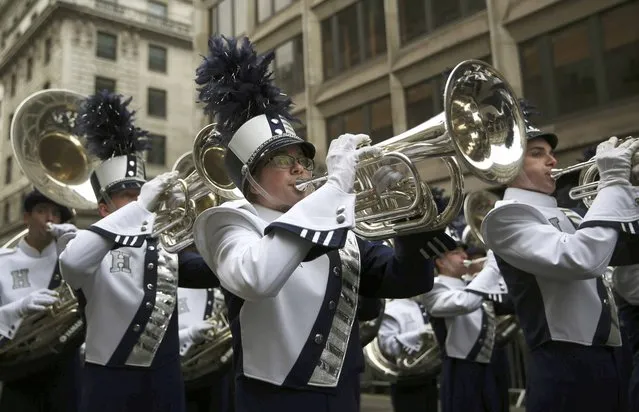 Members of the Hickory Ridge Blue Regiment marching band perform during the New Year's Day Parade in London, Britain January 1, 2016. (Photo by Neil Hall/Reuters)