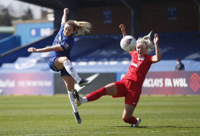 Chelsea's Erin Cuthbert in action with Birmingham City's Mollie Green  during the FA Women's Super League match at Kingsmeadow Stadium in London, United Kingdom on April 4, 2021. (Photo by Matthew Childs/Action Images via Reuters)