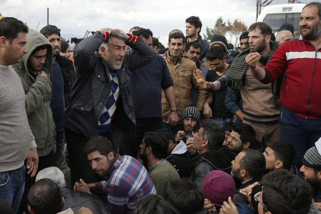 Migrants argue between themselves as they wait to cross the Greek-Macedonian border, near the village of Idomeni, Greece March 3, 2016. (Photo by Marko Djurica/Reuters)