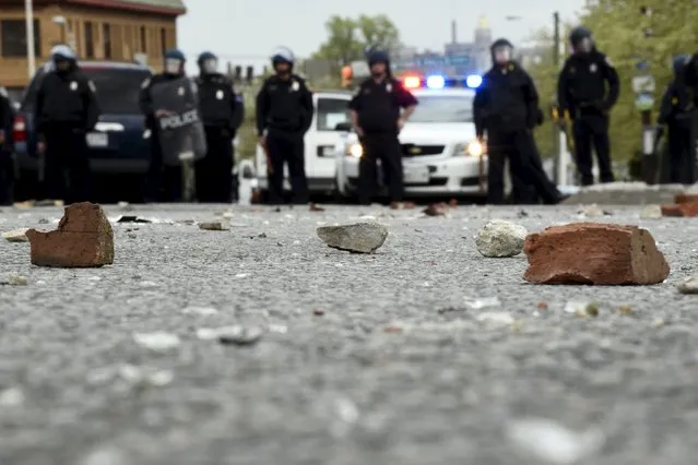 Bricks thrown by protests lie on Reisterstown Road in Baltimore April 27, 2015. (Photo by Sait Serkan Gurbuz/Reuters)