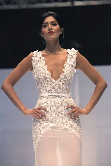 A model displays a creation by Lebanese designer Abed Mahfouz during the Spring-Summer 2015 fashion show in Beirut, April 29, 2015. (Photo by Alia Haju/Reuters)