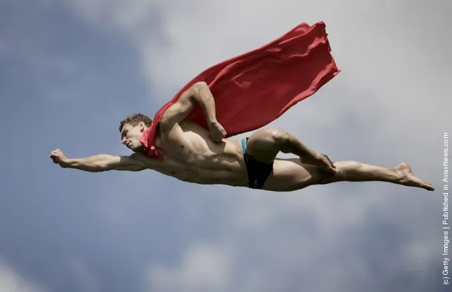 Michal Navratil of the Czech Republic performs a Superman dive from the 26 metre platform during round seven of the Red Bull Cliff Diving series