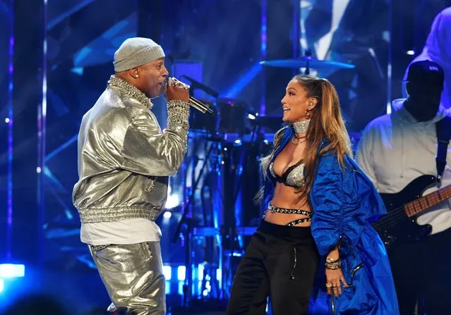 LL Cool J performs with Jennifer Lopez after being inducted into the Rock and Roll Hall of Fame in Cleveland, Ohio, U.S. October 30, 2021. (Photo by Gaelen Morse/Reuters)