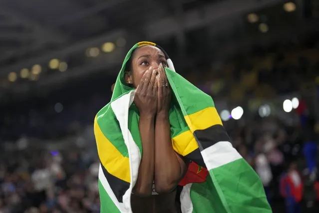 Thea Lafond, of Dominica, reacts after winning the gold medal in the women's triple jump during the World Athletics Indoor Championships at the Emirates Arena in Glasgow, Scotland, Sunday, March 3, 2024. (Photo by Bernat Armangue/AP Photo)