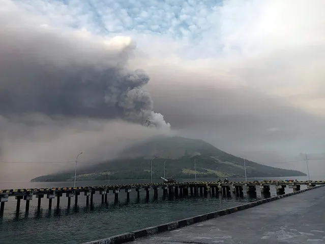 Mount Ruang volcano is seen during the eruption from Tagulandang island, Indonesia, Thursday, April 18, 2024. Indonesian authorities closed an airport and residents left homes near an erupting volcano Thursday due to the dangers of spreading ash, falling rocks, hot volcanic clouds and the possibility of a tsunami. (Photo by Hendra Ambalao/AP Photo)