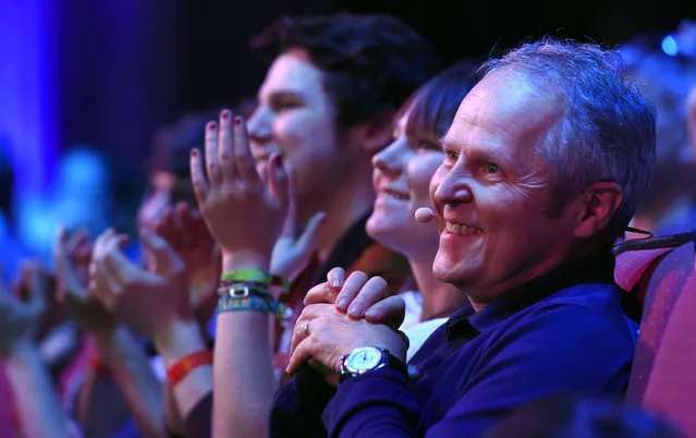 Ubisoft CEO Yves Guillemot watches the stage presentation from the front row at Ubisoft's E3 2015 Conference at the Orpheum Theatre on Monday, June 15, 2015, in Los Angeles. (Photo by Chris Pizzello/Invision/AP)