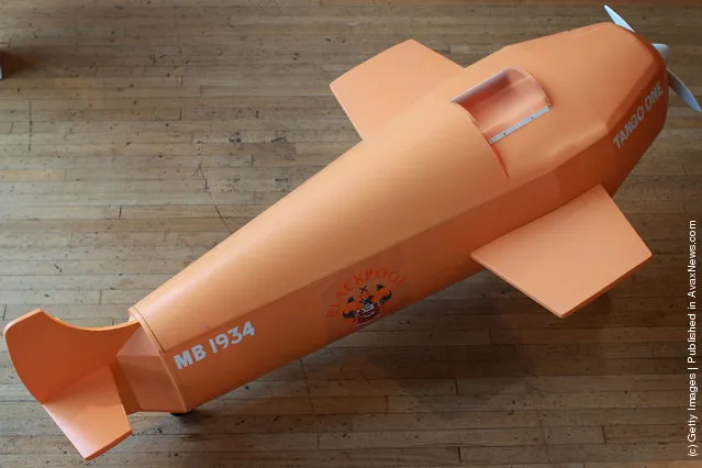 A coffin in the shape of a plane