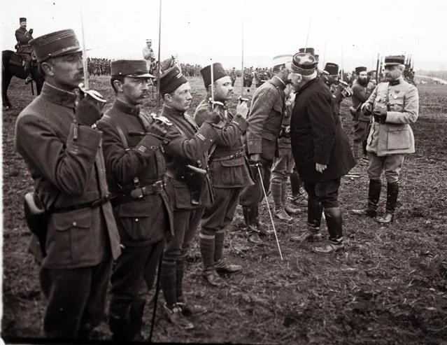 An archive picture shows French General Joseph Joffre (2nd R) congratulating and awarding medals to soldiers, who fought in the Battle of Verdun, in Verdun March 1916. (Photo by Collection Odette Carrez/Reuters)