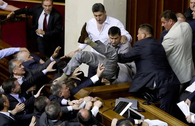 Lawmakers from pro-presidential and oppositional factions  in the parliament session hall in Kiev, Ukraine on May 24, 2012