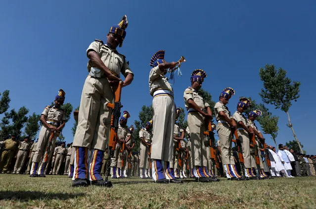 India's Central Reserve Police Force (CRPF) personnel attend a wreath laying ceremony of their colleagues, who were killed in a militant attack on a CRPF convoy on Saturday, in Humhama, on the outskirts of Srinagar, June 26, 2016. (Photo by Danish Ismail/Reuters)