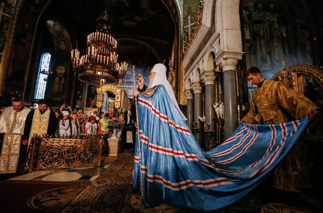 The Filaret (C), Patriarch of Ukrainian Orthodox Church of Kiev patriarchate with priests attends a prayer service marking the 1028th anniversary of Kievan Rus Christianization in the St. Volodymir cathedral in Kiev, Ukraine, 28 July 2016. Orthodox believers mark the 1028th anniversary of Kievan Rus Christianization on 27-28 July. (Photo by Roman Pilipey/EPA)