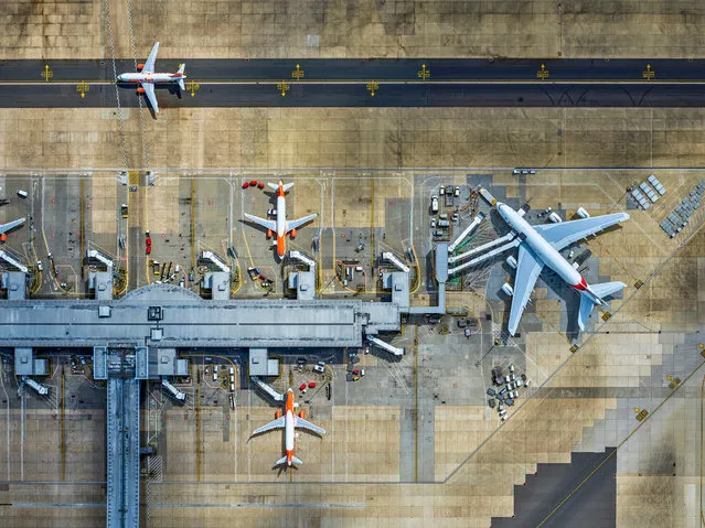 An aerial photograph shows a runway at Gatwick airport, England on August 12, 2016. The airport achieved the busiest single month in its 80-year history in July, with 4.6m passengers travelling through the terminals. (Photo by Jeffrey Milstein/Gatwick Airport/PA Wire)